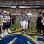 081220-N-7090S-110 Washington D.C. (Dec. 20, 2008) The referee conducts the ceremonial coin toss before the inaugural Eagle Bank Bowl between the Navy Midshipmen and the Wake Forest Demon Deacons. (U.S. Navy photo by Mass Communication Specialist 2nd Class Jhi L. Scott/Released)